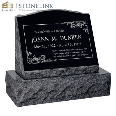 Multicolored slant granite tombstone